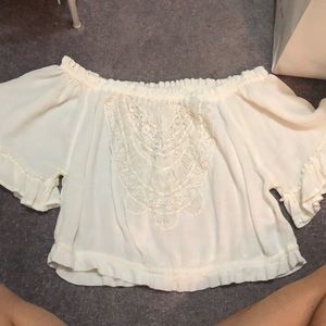 worn once over the shoulder top